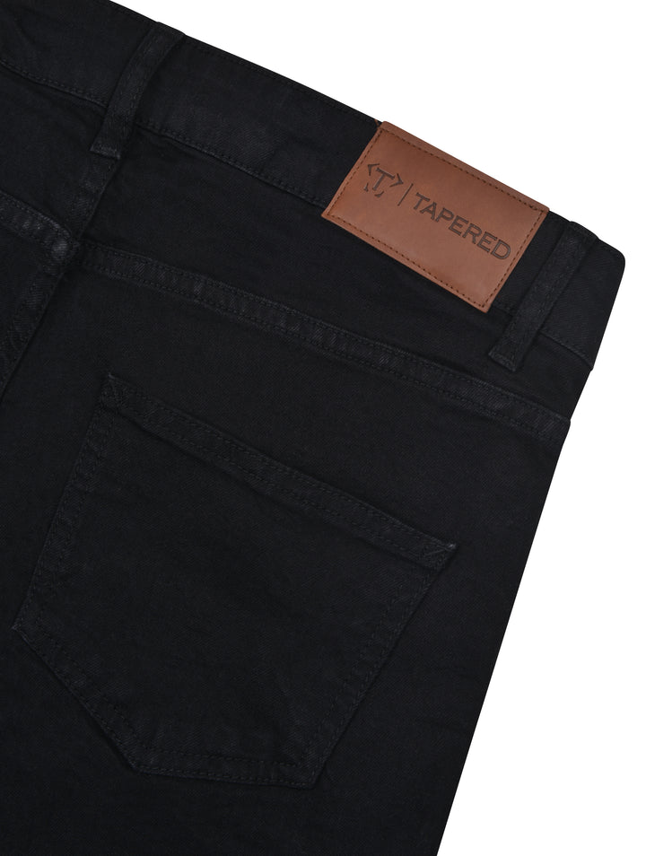 Black Tapered Jeans with Brown Leather Patch