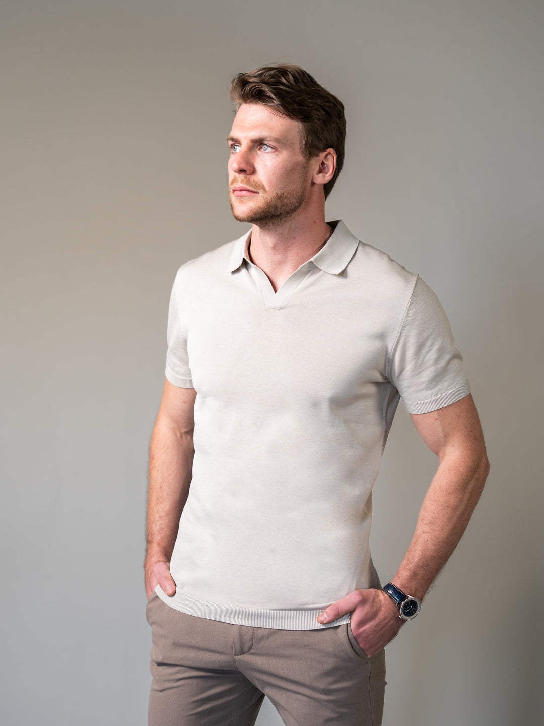 Beige knitted polo with revere collar tailored for men with a tapered fit