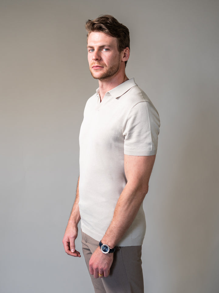 Close-fitting beige knitted polo for men with broad shoulders and a narrow waist