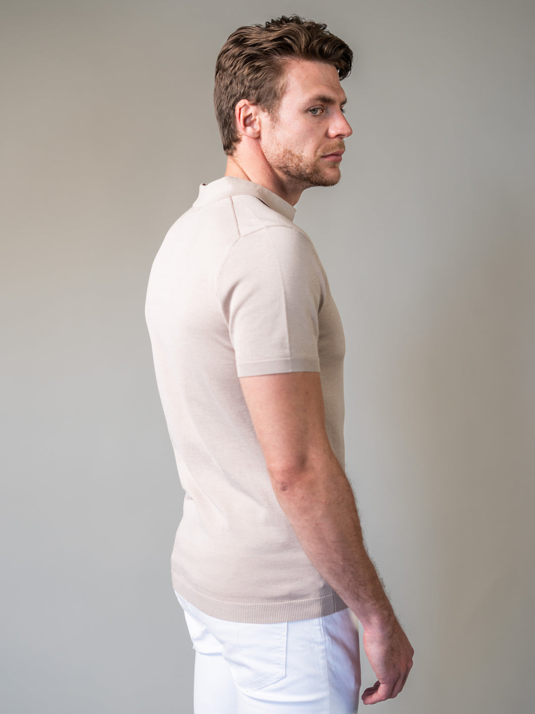 Smart light brown knitted polo shirt with revere collar and clean tapered lines