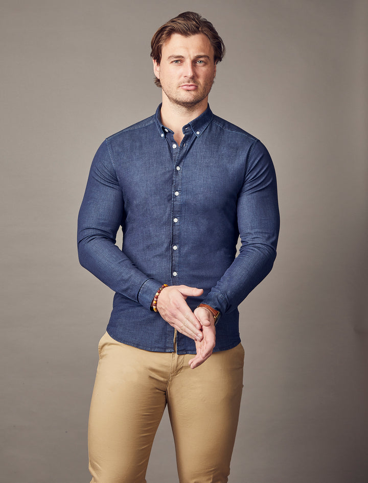 Navy blue denim shirt with a tapered fit, proportionally tailored for a jean muscle fit, ideal for muscular builds.