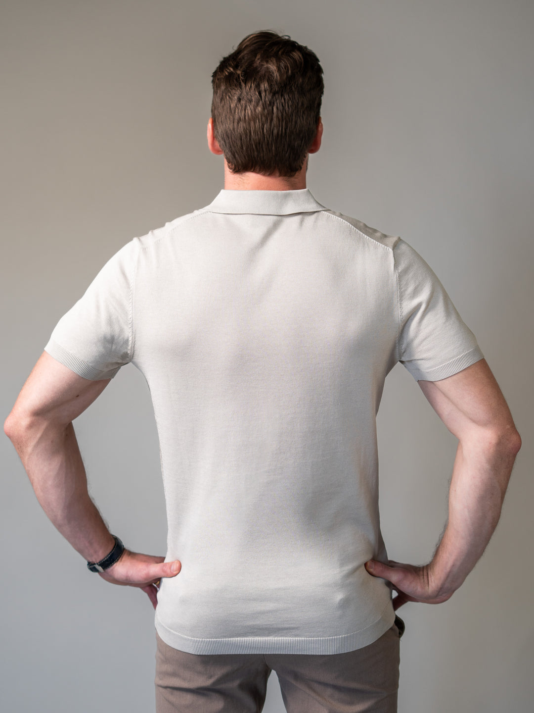 Tapered fit beige knit polo with revere collar for a modern smart-casual look