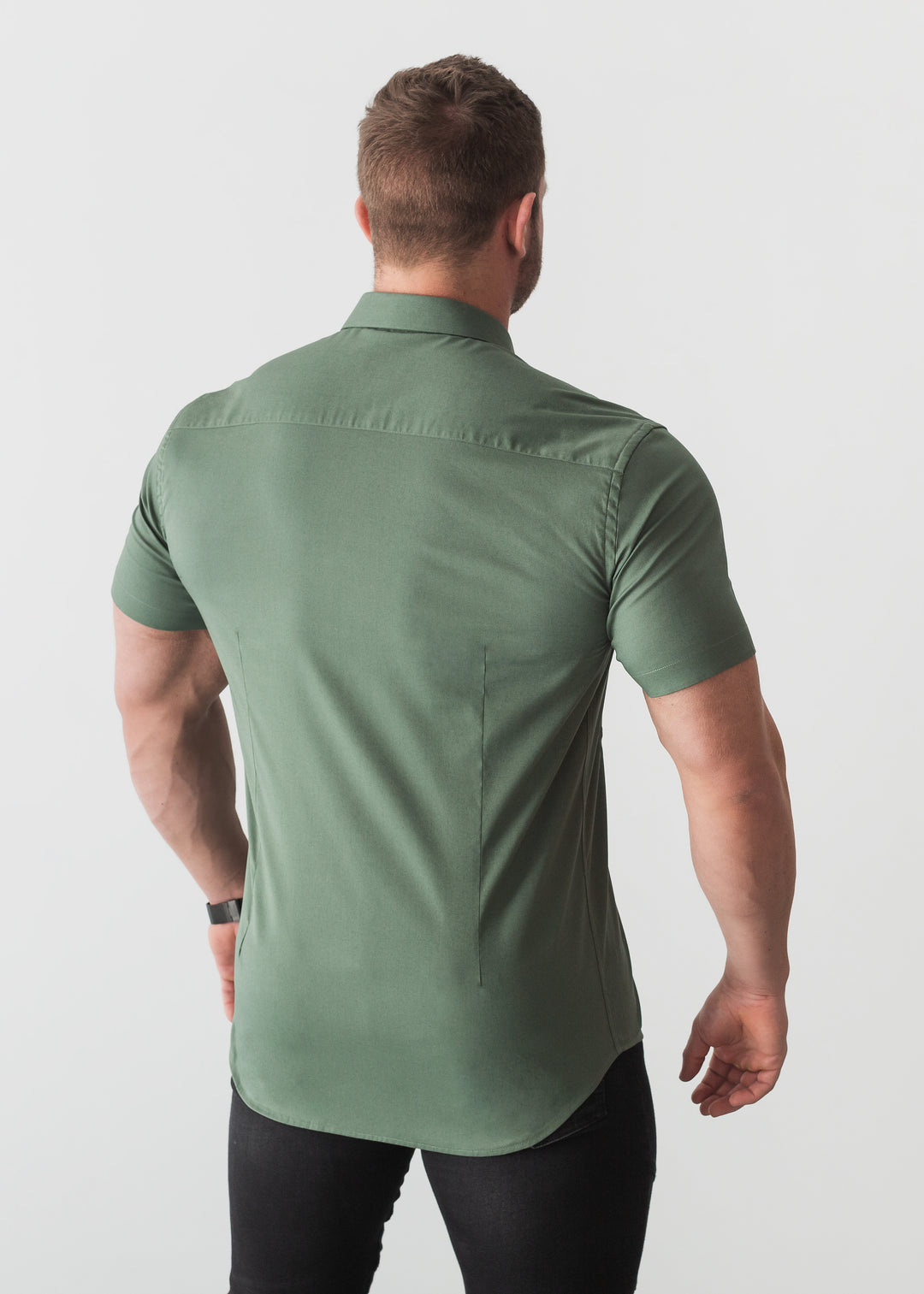 Olive tapered-fit shirt by Tapered Menswear, featuring a muscle-fit design for a flattering and well-defined silhouette.